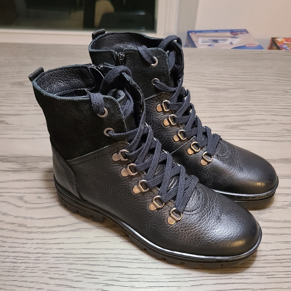 Eric Michael Kai black combat boots